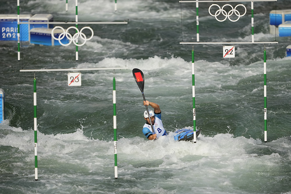 Quan Xin competes in men's kayak single finals